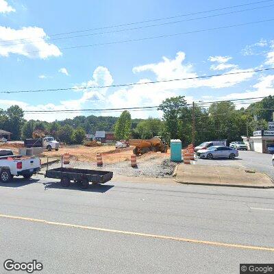 Thumbnail image of the front of a dentist office practice with the name Aspen Dental which is located in Lenoir, NC