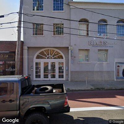 Thumbnail image of the front of a dentist office practice with the name Peridontics & Dental Implants which is located in Somerville, MA