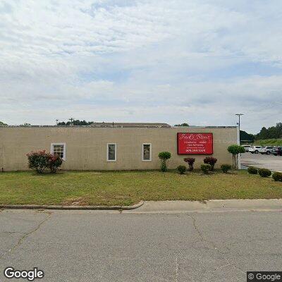 Thumbnail image of the front of a dentist office practice with the name Village Family Dental which is located in Laurinburg, NC