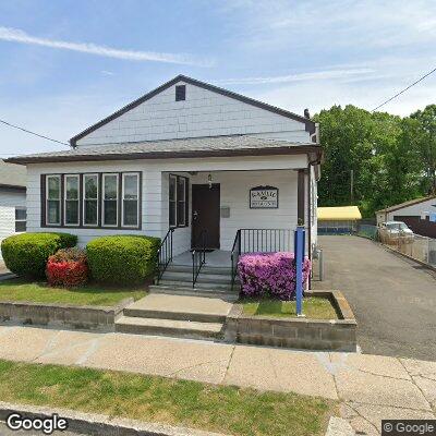 Thumbnail image of the front of a dentist office practice with the name Kamlic Dental Center which is located in Bridgeport, CT