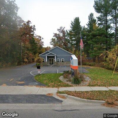 Thumbnail image of the front of a dentist office practice with the name East Bay Family Dentistry which is located in Traverse City, MI