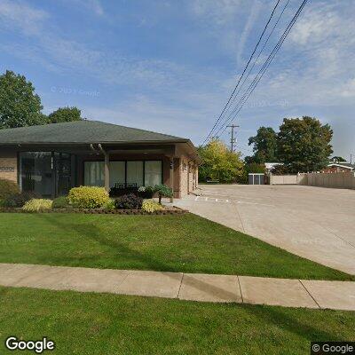 Thumbnail image of the front of a dentist office practice with the name Michigan Implants and Periodontics PLC which is located in Jackson, MI