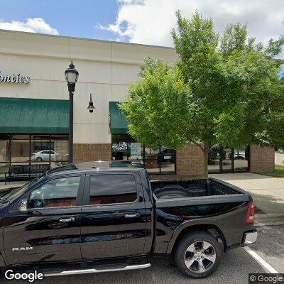 Thumbnail image of the front of a dentist office practice with the name Reflections Dental which is located in Raleigh, NC