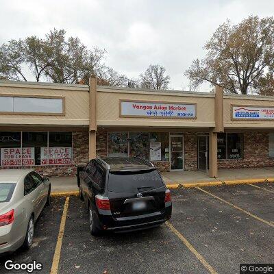 Thumbnail image of the front of a dentist office practice with the name Smiles By Design which is located in Kansas City, KS