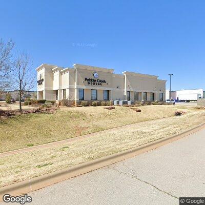 Thumbnail image of the front of a dentist office practice with the name Pebble Creek Dental which is located in Mustang, OK