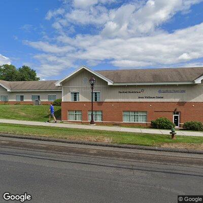 Thumbnail image of the front of a dentist office practice with the name Avon Wellness Center Dental Associates which is located in Avon, CT