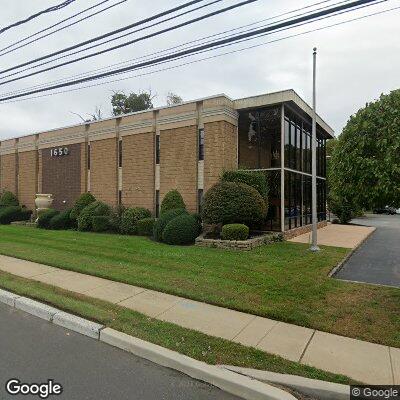 Thumbnail image of the front of a dentist office practice with the name Your Family Dentist which is located in Middletown, NJ