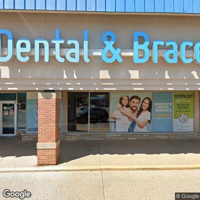 Thumbnail image of the front of a dentist office practice with the name Kool Smiles which is located in Terre Haute, IN