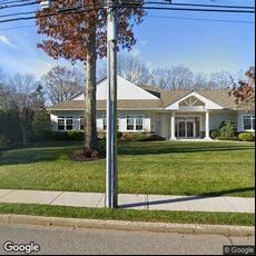 Julie Ann Mathew, DDS, dentists office located at 112 Alexander Ave, Lake Grove, NY.